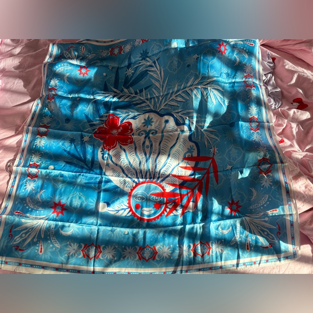 Vibrant Blue and Red Scarf with Artistic Design